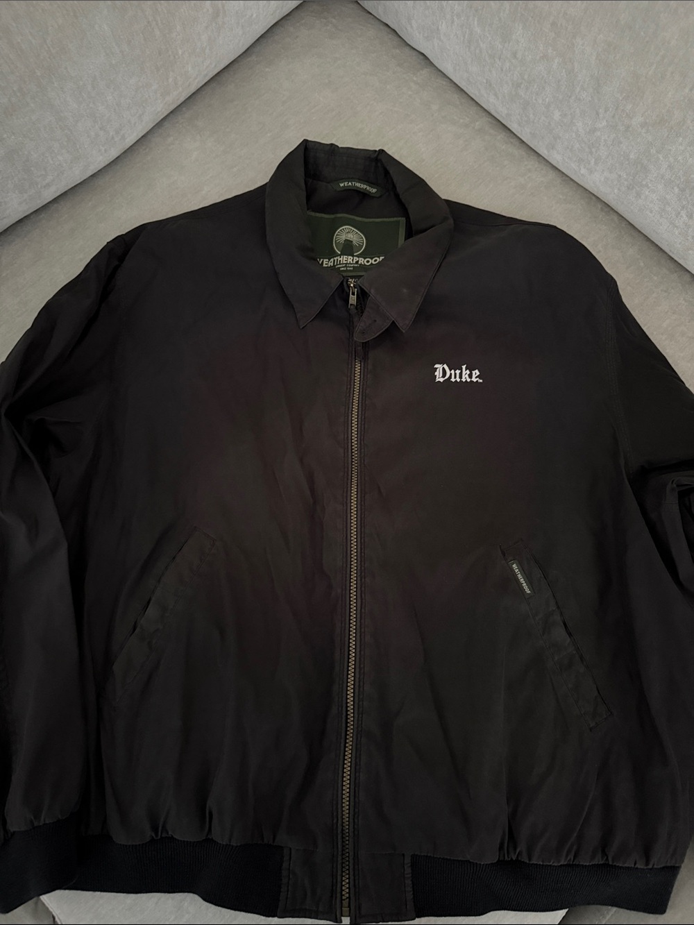 Weatherproof Black Bomber Jacket with Duke University logo on chest